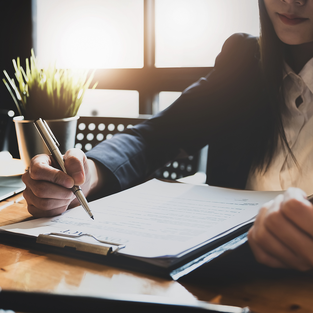 lawyer writing in a notebook