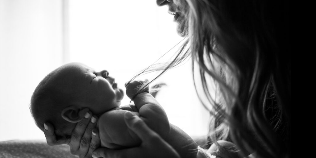 silhouette of mother and baby