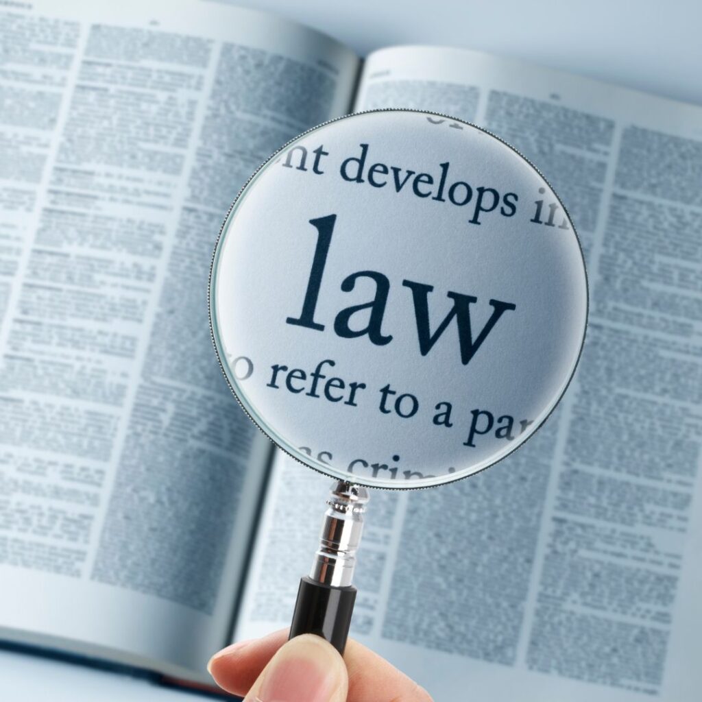 law book with magnify glass