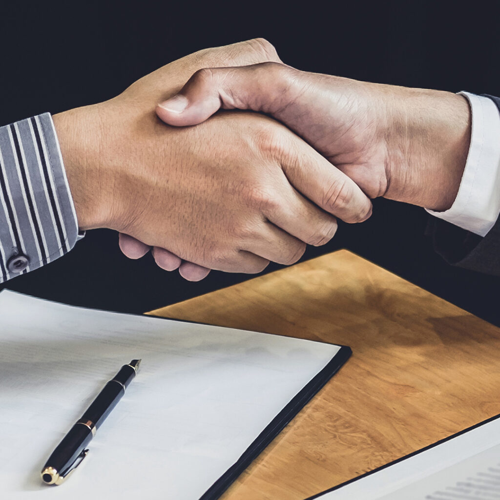 Lawyer and client shaking hands