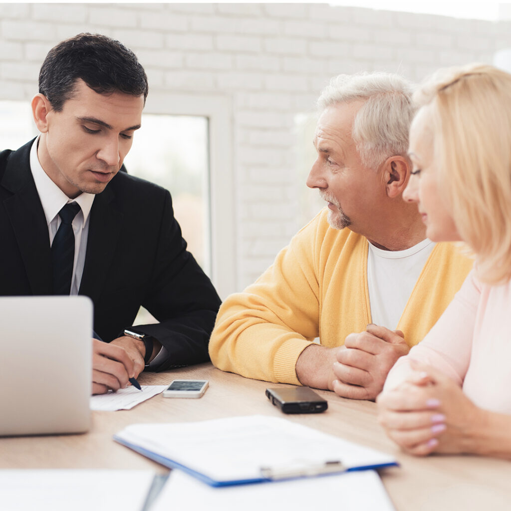 A lawyer speaking to his clients
