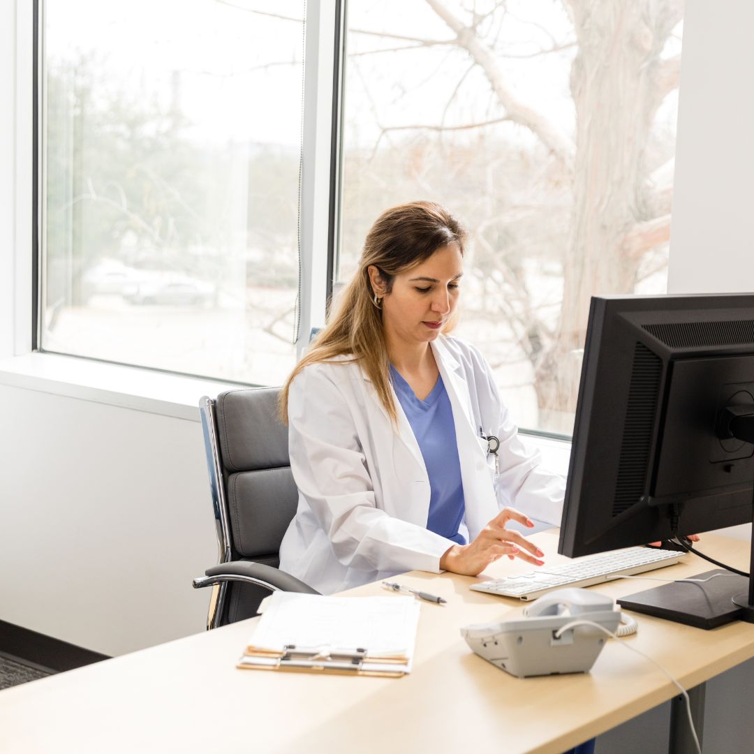 Doctor working on computer