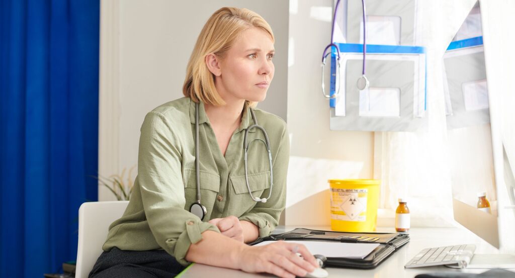 Doctor working on computer