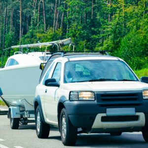 A truck with a boat trailer.