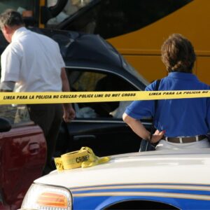 Police on the scene of a bus crash.