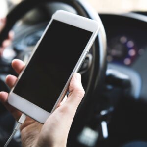 A driver suing a phone.