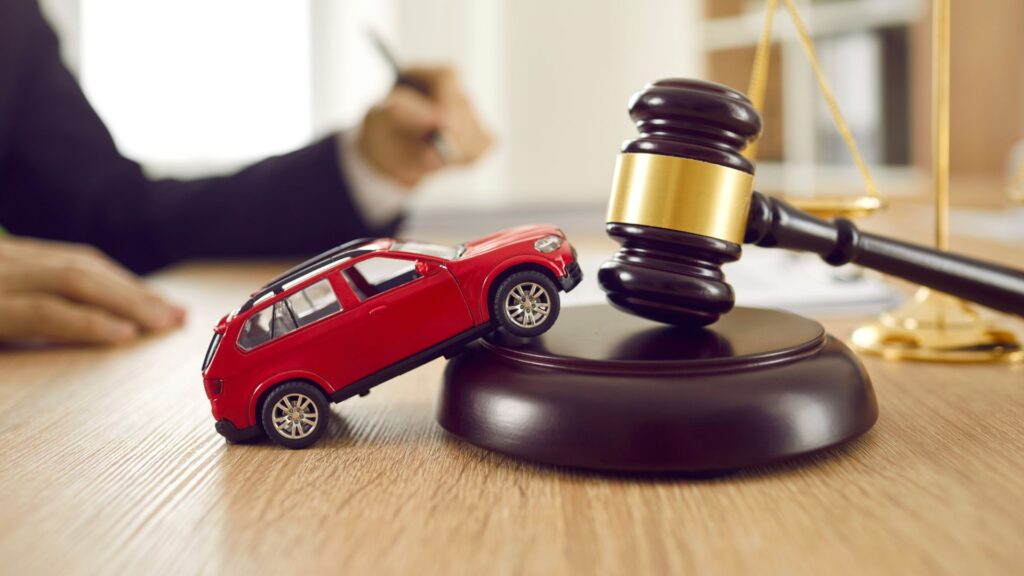 gavel and toy car
