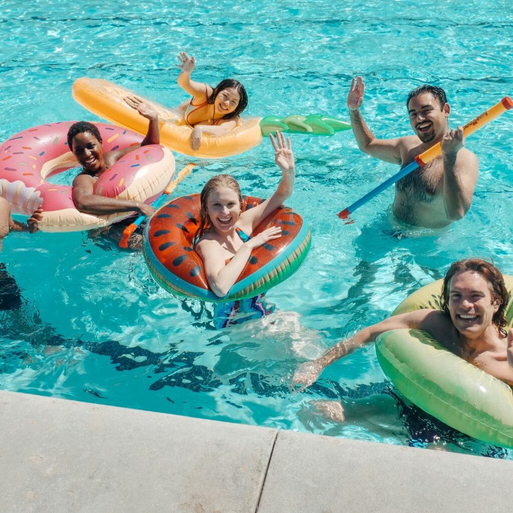 photo of people in pool