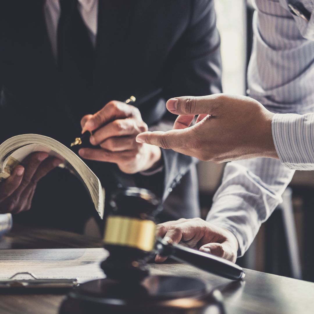 A lawyer meets with a client