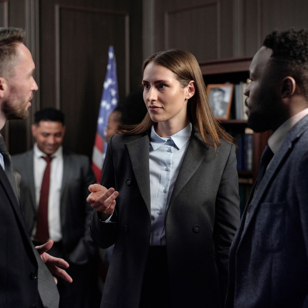 Lawyers talk together