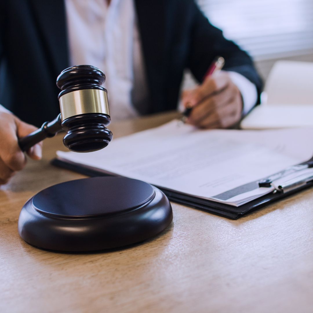 holding a gavel in hand