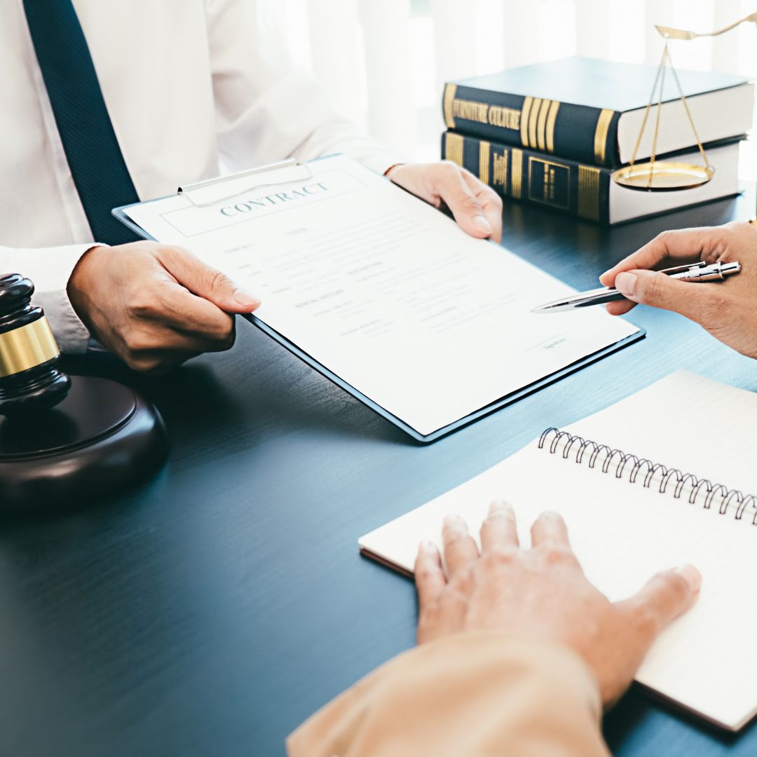 accident lawyer holding contract