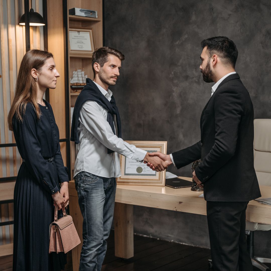 people meeting with attorney