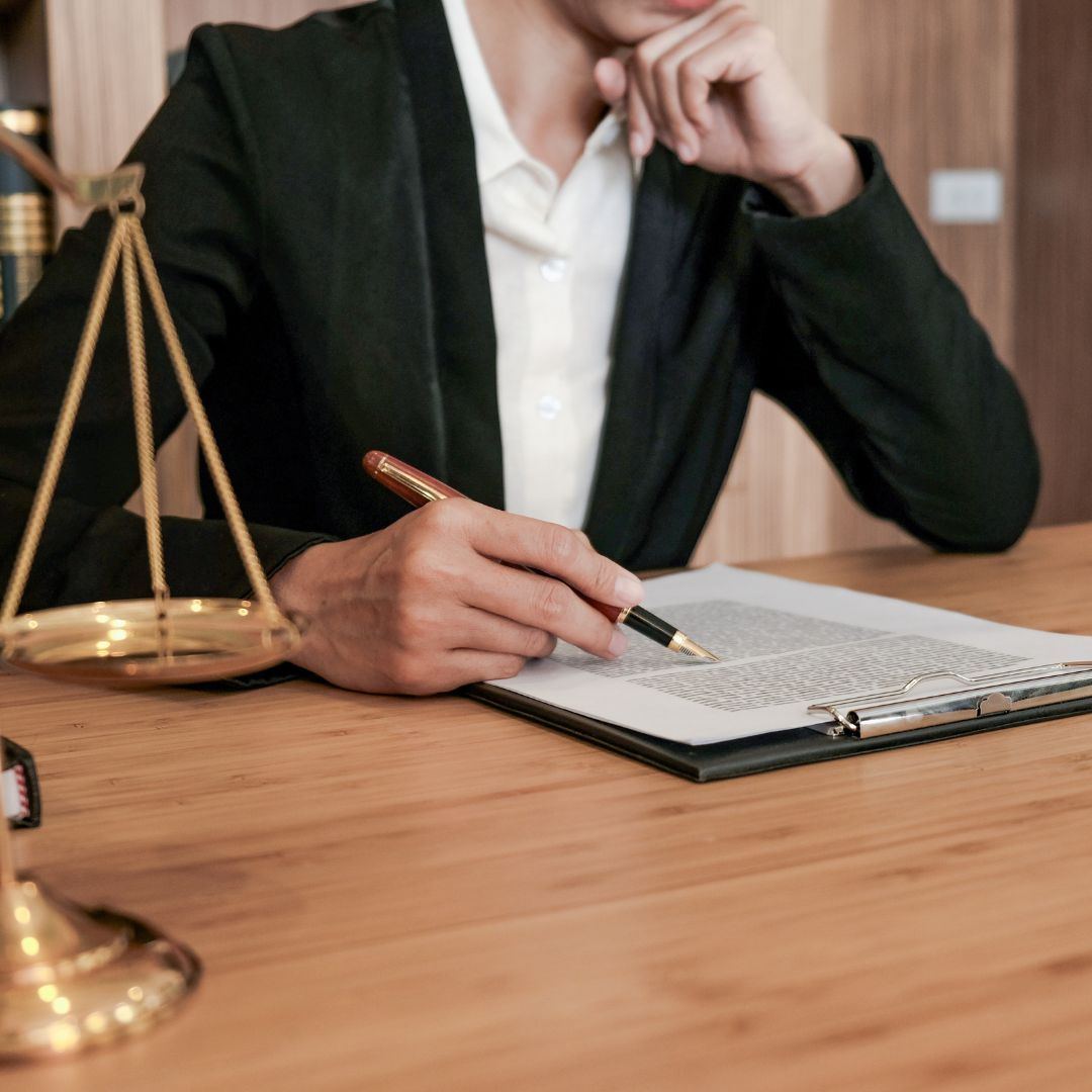 A lawyer reviewing paperwork