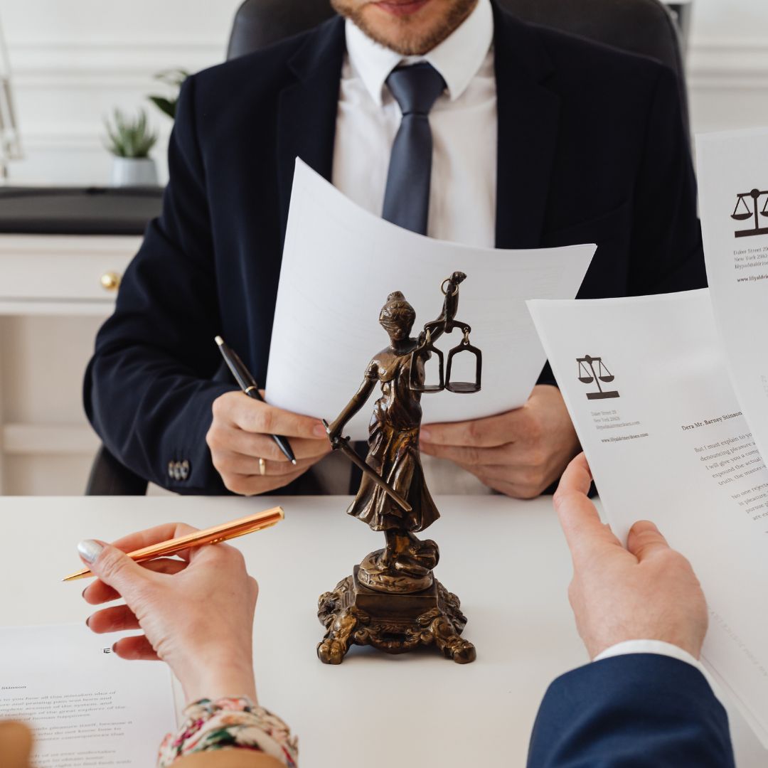 Lawyers reviewing paperwork