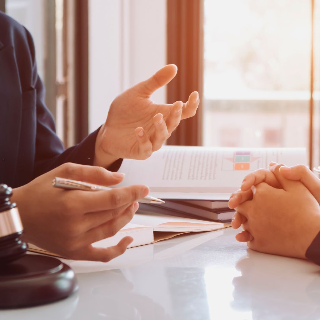 A lawyer and client speaking