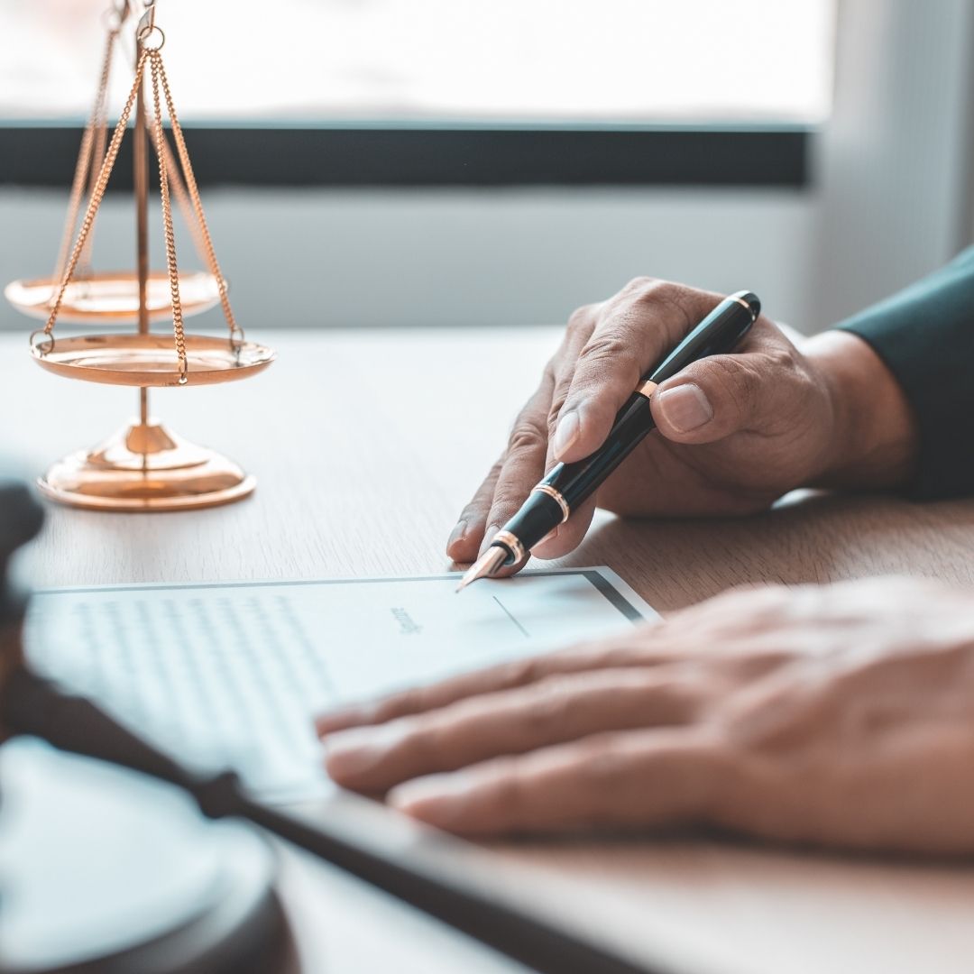 attorney signing paperwork