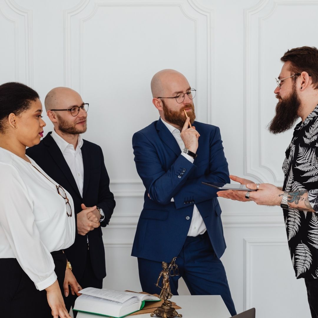 lawyer speaking with witnesses