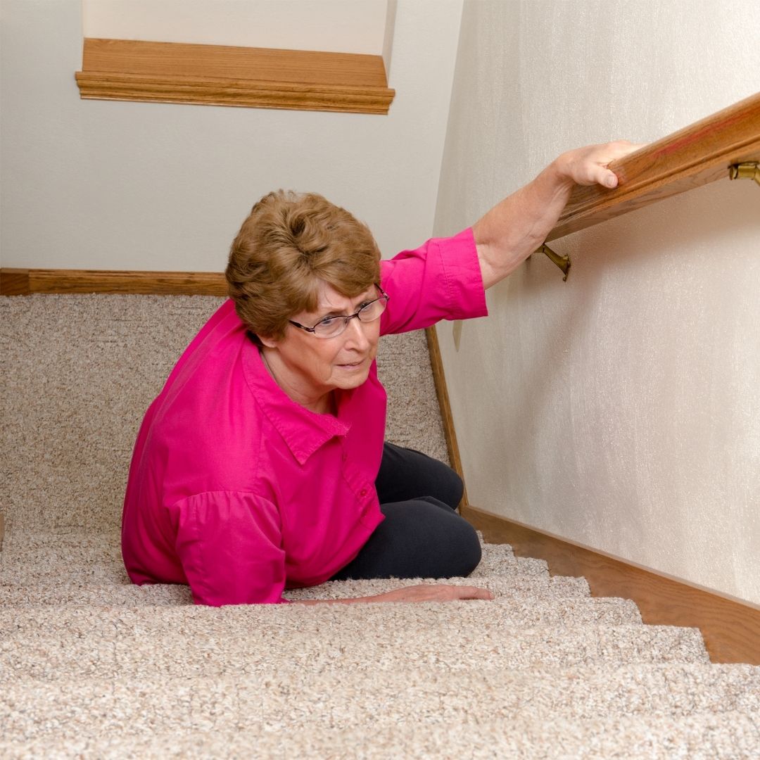 older woman who recently fell on the stairs