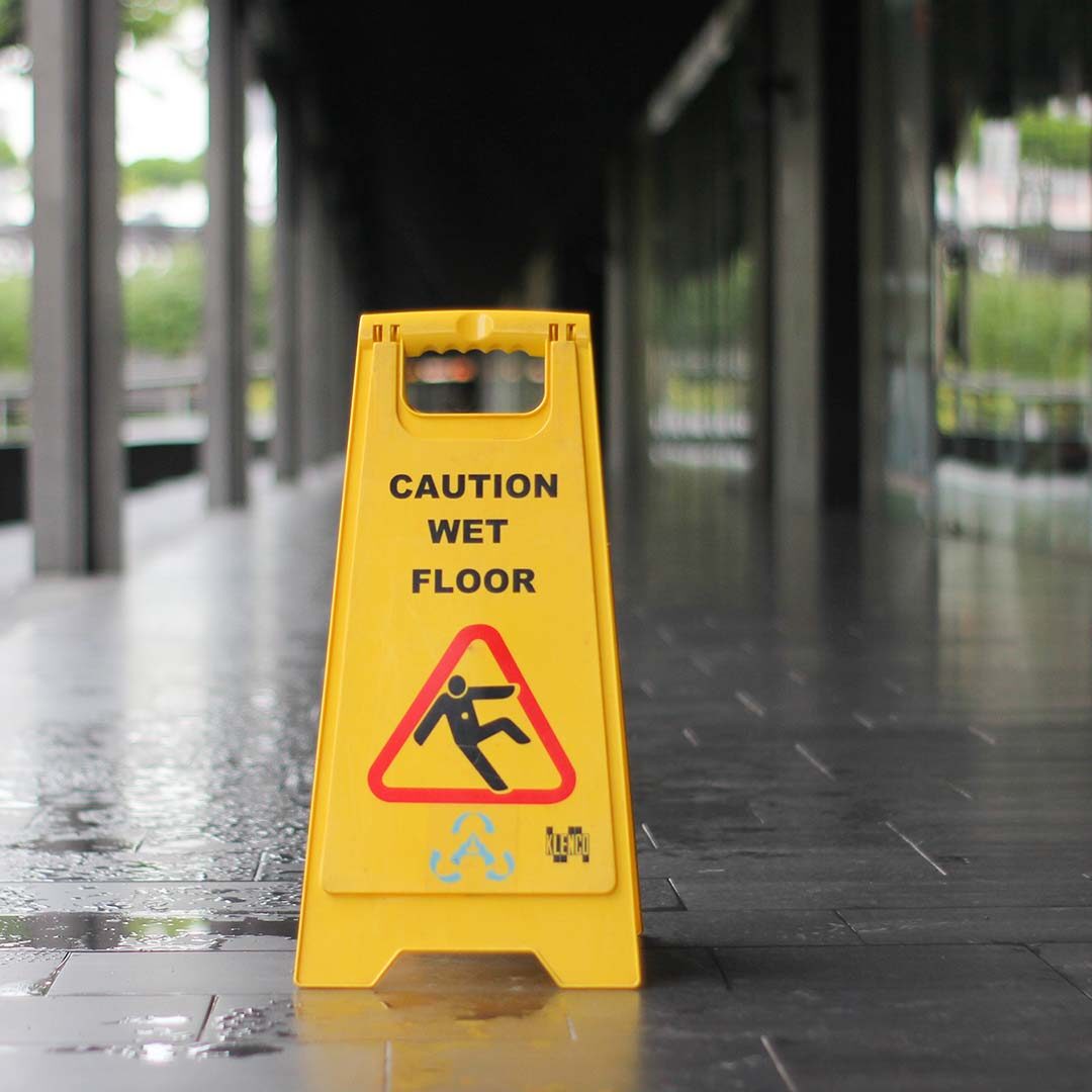 Caution sign on wet floor