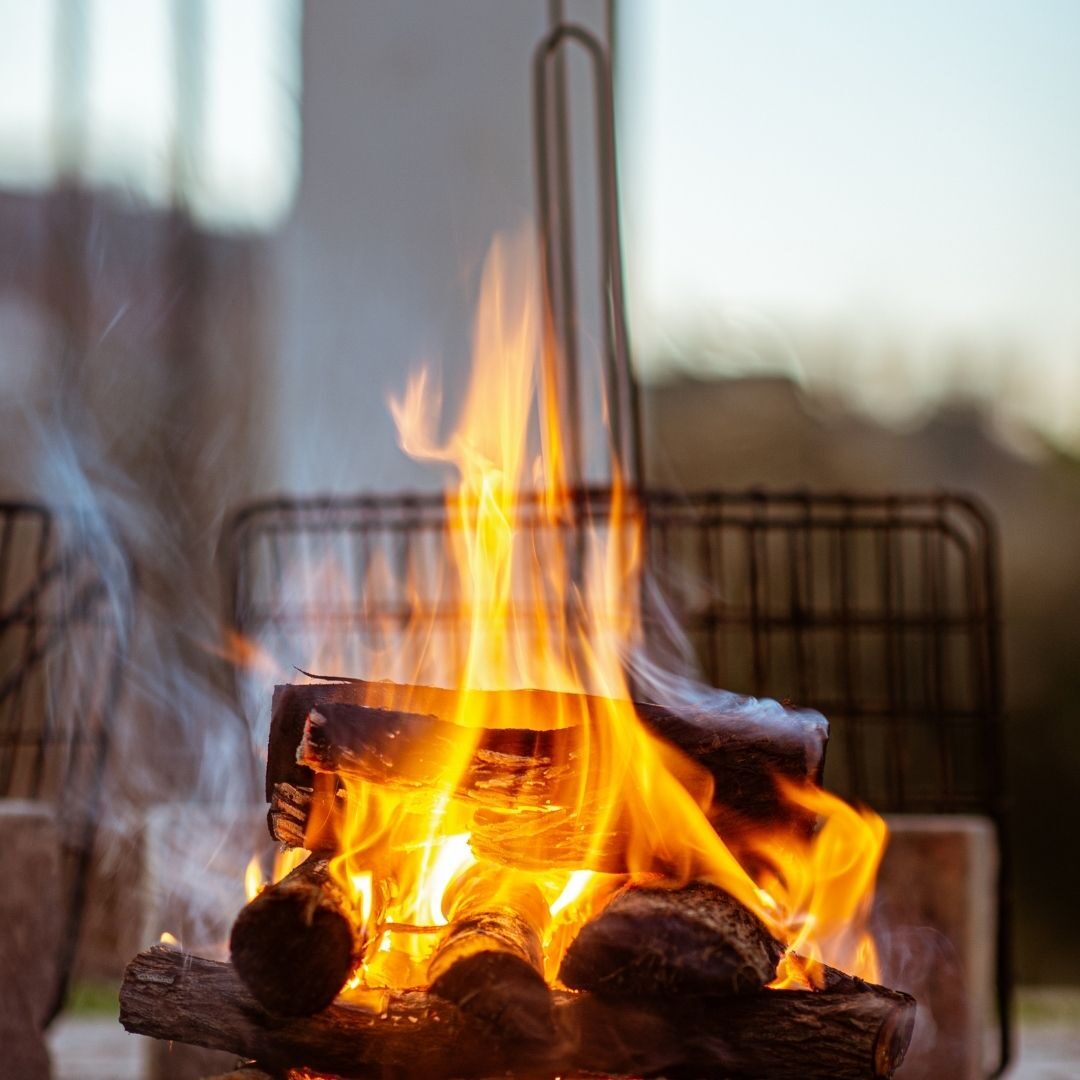 A firepit with a good sized fire going